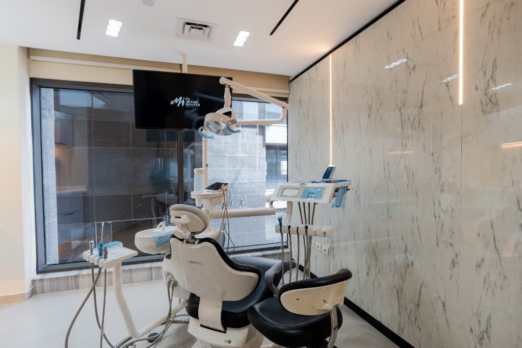 Doctor and assistant giving gentle care at Dr. Michael Iskander Dental Clinics
